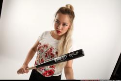 Woman Young Average Standing poses Casual Asian Fighting with bat