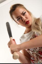 Woman Young Average Standing poses Casual Asian Fighting with bat