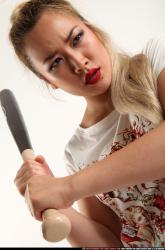 Woman Young Average Standing poses Casual Asian Fighting with bat