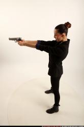 Woman Young Athletic White Fighting with gun Standing poses Casual