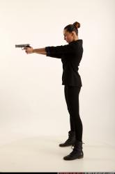 Woman Young Athletic White Fighting with gun Standing poses Casual