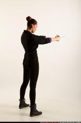 Woman Young Athletic White Fighting with gun Standing poses Casual