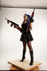 dolores-dual-tommyguns-pose1