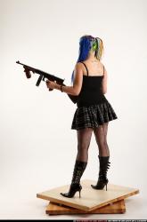 Woman Young Average White Fighting with submachine gun Standing poses Casual