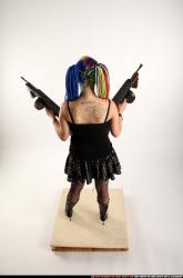 Woman Young Average White Fighting with submachine gun Standing poses Casual