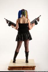 Woman Young Average White Fighting with submachine gun Standing poses Casual