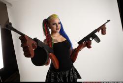 dolores-dual-tommyguns-pose1