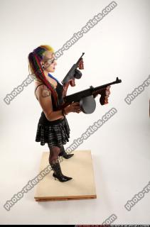 2016 03 DOLORES DUAL TOMMYGUNS POSE1 06 A