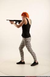 Woman Adult Athletic White Fighting with submachine gun Standing poses Casual