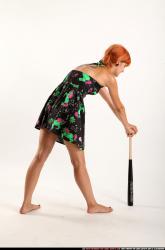Woman Adult Athletic White Standing poses Casual Fighting with bat