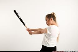 Woman Young Average Standing poses Casual Asian Fighting with bat