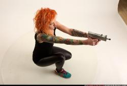 Woman Adult Athletic White Fighting with submachine gun Kneeling poses Casual