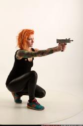 Woman Adult Athletic White Fighting with submachine gun Kneeling poses Casual