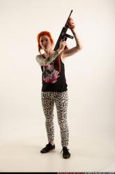 Woman Adult Athletic White Fighting with submachine gun Standing poses Casual