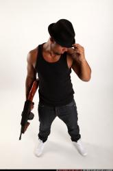 Man Adult Athletic Black Fighting with submachine gun Standing poses Casual