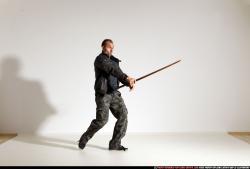 Man Adult Athletic White Fighting with sword Moving poses Jacket
