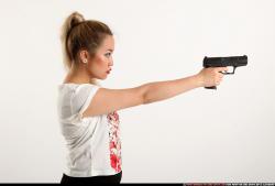 Woman Young Average Fighting with gun Standing poses Casual Asian