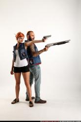 Man & Woman Adult Athletic White Standing poses Casual Fighting with shotgun