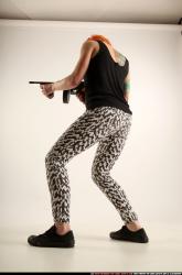 Woman Adult Athletic White Fighting with submachine gun Standing poses Casual