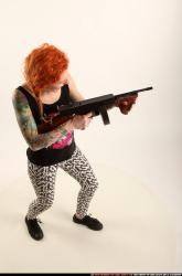 Woman Adult Athletic White Fighting with submachine gun Standing poses Casual