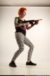 Woman Adult Athletic White Fighting with submachine gun Standing poses Casual