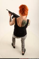 Woman Adult Athletic White Fighting with submachine gun Standing poses Casual