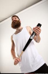 Man Adult Athletic White Standing poses Casual Fighting with bat