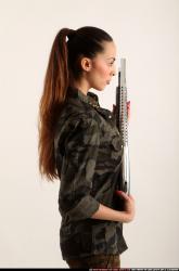 Woman Young Athletic White Standing poses Army Fighting with shotgun