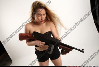 kaya-standing-tommygun