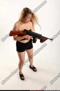 kaya-standing-tommygun
