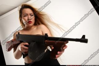 kaya-standing-tommygun