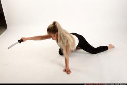 Woman Young Average Fighting with sword Kneeling poses Casual Asian