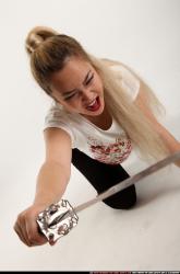 Woman Young Average Fighting with sword Kneeling poses Casual Asian