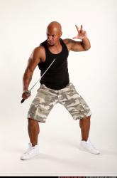 Man Adult Athletic Black Fighting with sword Standing poses Army