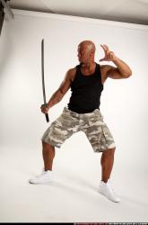 Man Adult Athletic Black Fighting with sword Standing poses Army