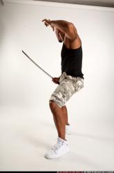 Man Adult Athletic Black Fighting with sword Standing poses Army