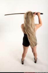 Woman Young Average Fighting with sword Standing poses Casual Asian