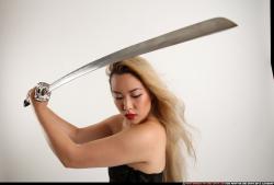 Woman Young Average Fighting with sword Standing poses Casual Asian