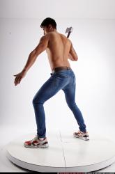 Man Young Athletic Fighting with sword Standing poses Pants Latino