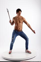 Man Young Athletic Fighting with sword Standing poses Pants Latino