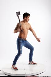 Man Young Athletic Fighting with sword Standing poses Pants Latino