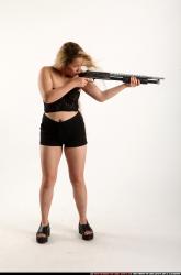 kayaa-standing-aiming-shotgun