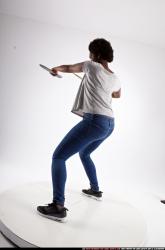Woman Adult Athletic Black Fighting with sword Standing poses Casual