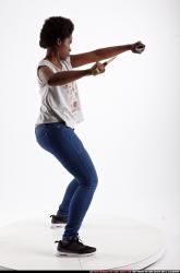 Woman Adult Athletic Black Fighting with sword Standing poses Casual