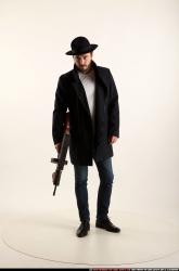 Man Adult Athletic White Fighting with submachine gun Standing poses Coat