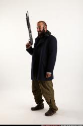 Man Adult Athletic White Standing poses Coat Fighting with shotgun