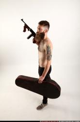 Man Adult Athletic White Fighting with submachine gun Standing poses Pants