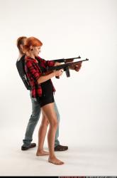 Man & Woman Adult Athletic White Fighting with submachine gun Sitting poses Casual