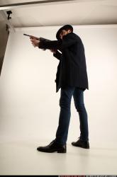 Man Adult Athletic White Fighting with gun Standing poses Coat
