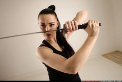 Woman Adult Athletic White Fighting with sword Standing poses Casual